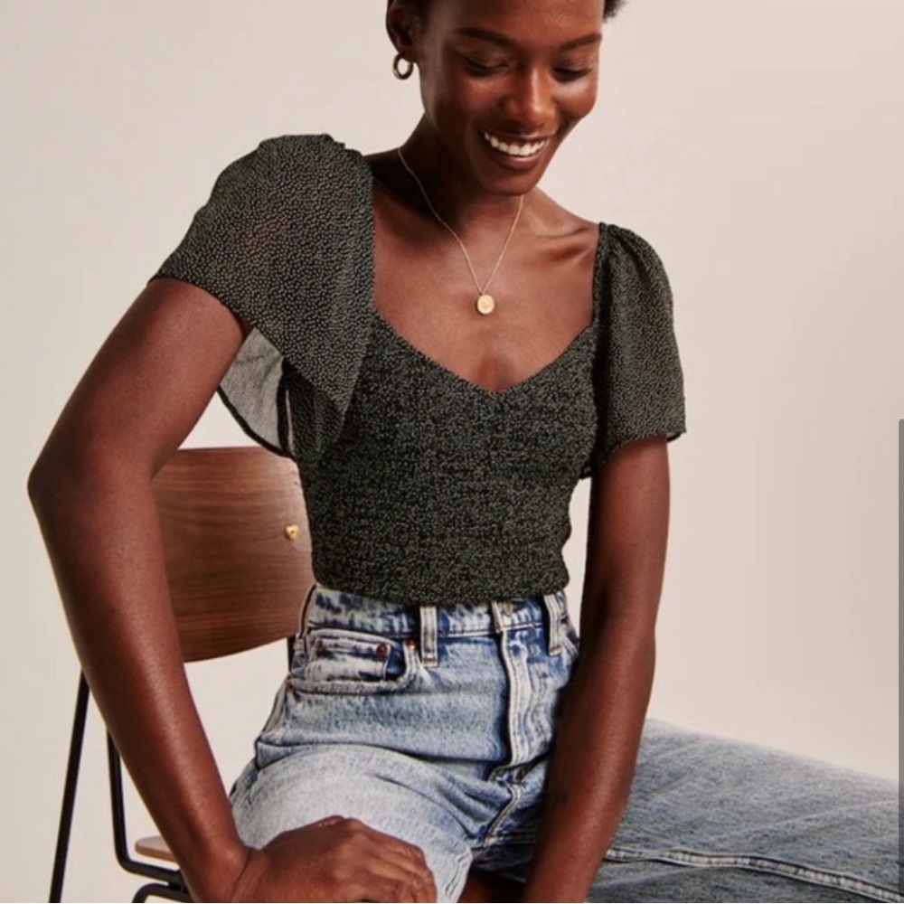 Abercrombie and Fitch All Over smocked flutter top